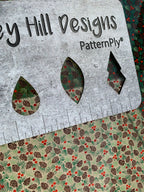 PatternPly® Scattered Pinecones and Berries sheet showing the pattern