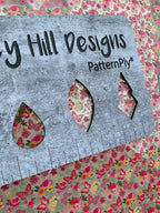 PatternPly® Scattered Butterflies and Flowers sheet showing the pattern
