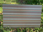 PatternPly® Full Coverage Aztec Orange sheet showing the pattern