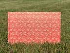 PatternPly® Full Coverage Red and Gold Holly sheet showing the pattern