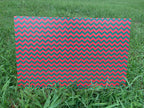 PatternPly® Full Coverage Red and Green Chevron sheet showing the pattern