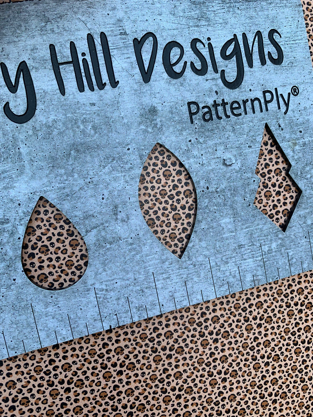 PatternPly® Full Coverage Micro Skull Leopard sheet showing the pattern