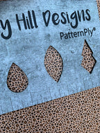 PatternPly® Full Coverage Micro Skull Leopard sheet showing the pattern
