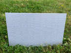 PatternPly® Full Coverage Blue and White Watercolor Stripes sheet showing the pattern