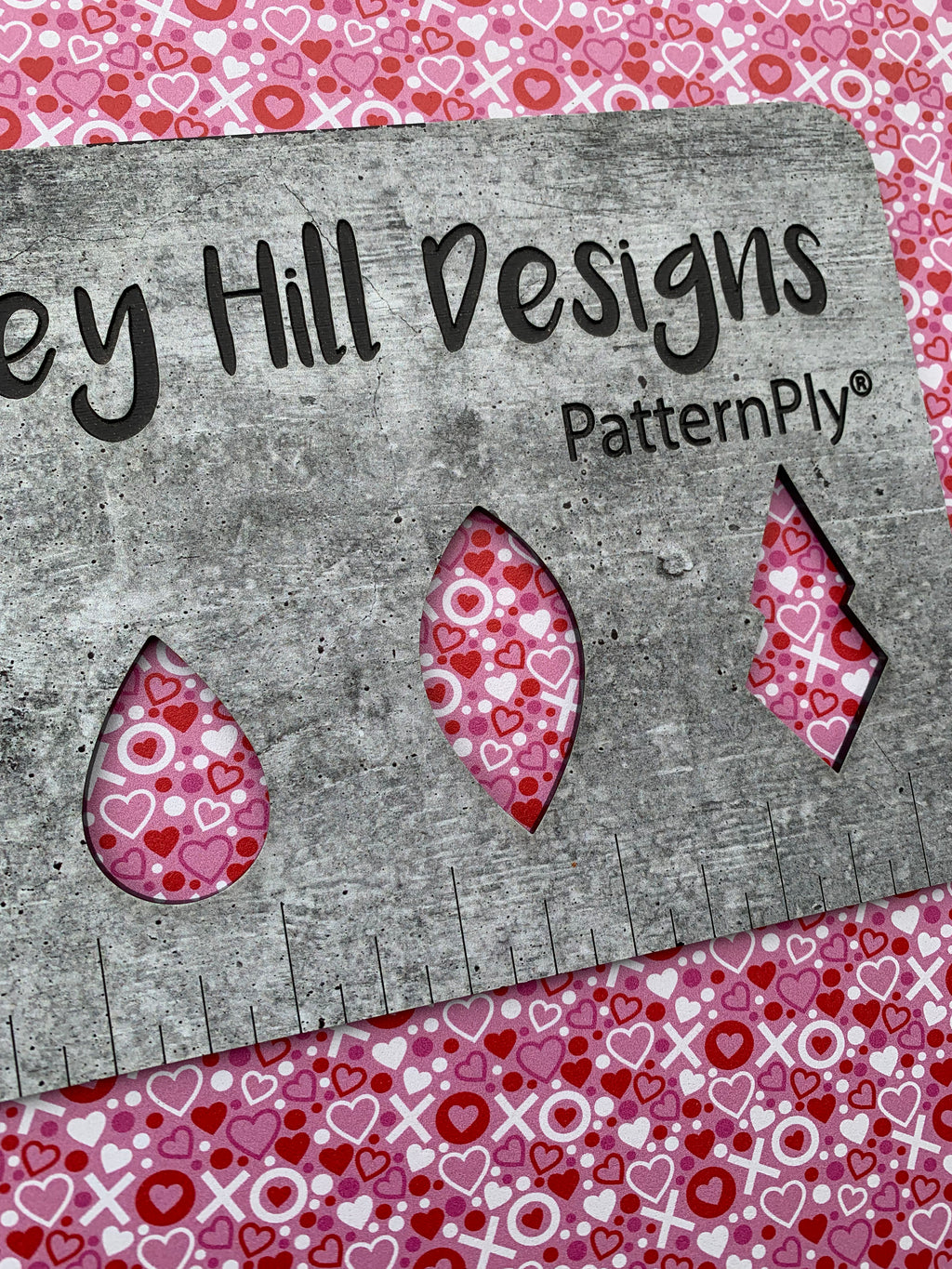 PatternPly® Full Coverage XO Hearts (Pink Background) sheet showing the pattern