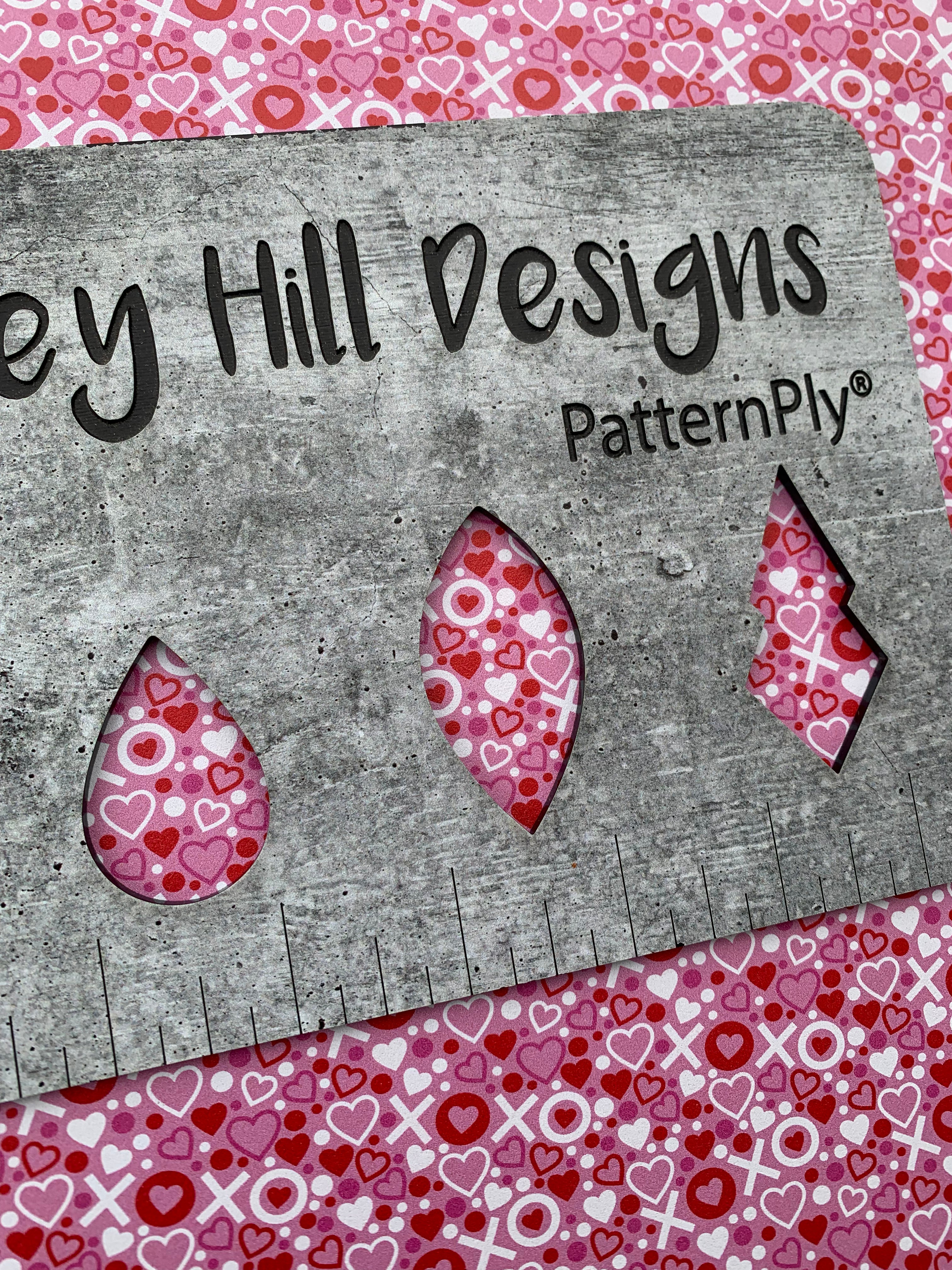 PatternPly® Full Coverage XO Hearts (Pink Background) sheet showing the pattern