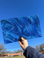 PatternPly® Transparent Chunky Blue Glitter* Swirl sheet showing the pattern