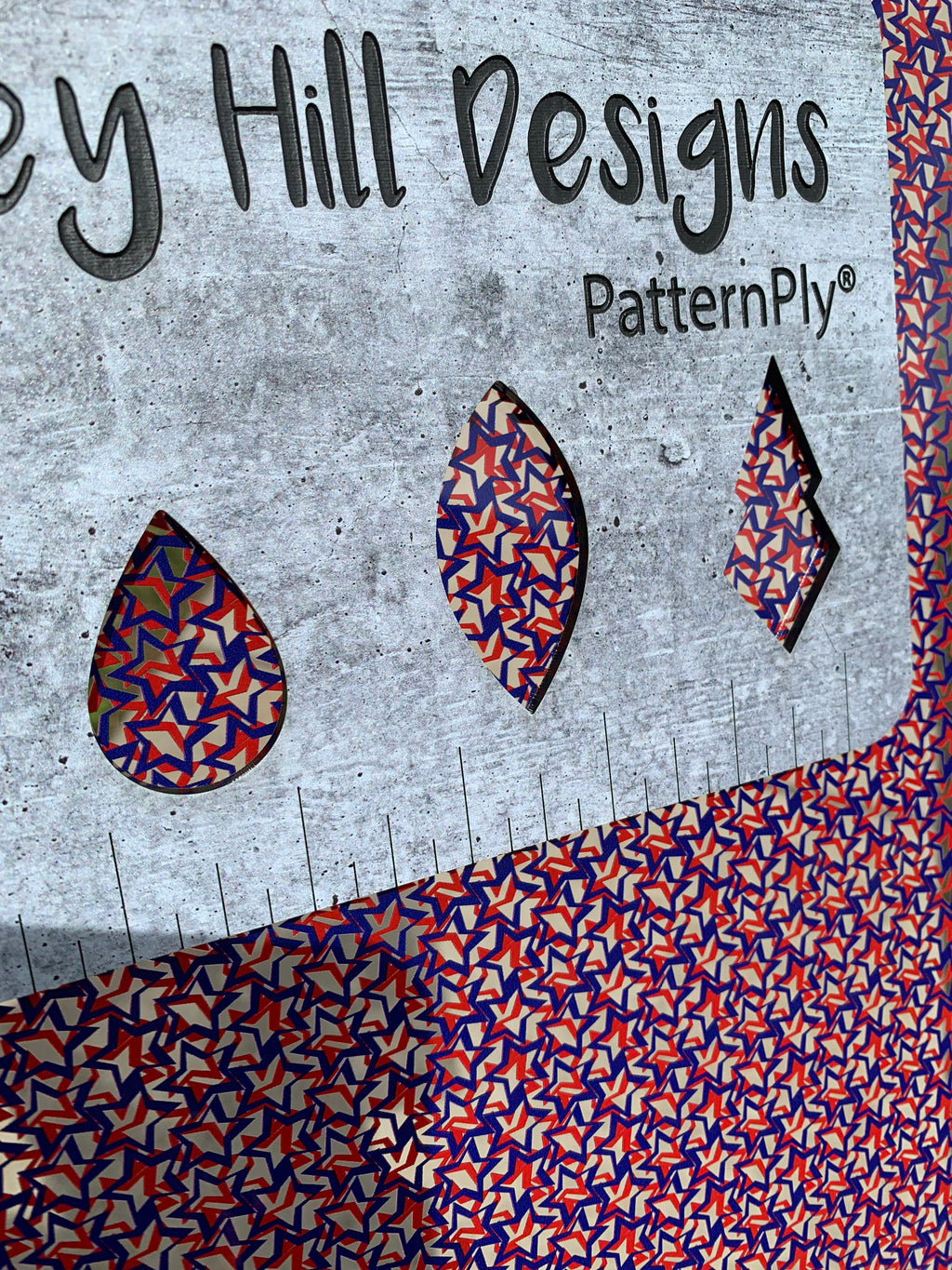 PatternPly® Scattered Red and Blue Overlapping Stars sheet showing the pattern