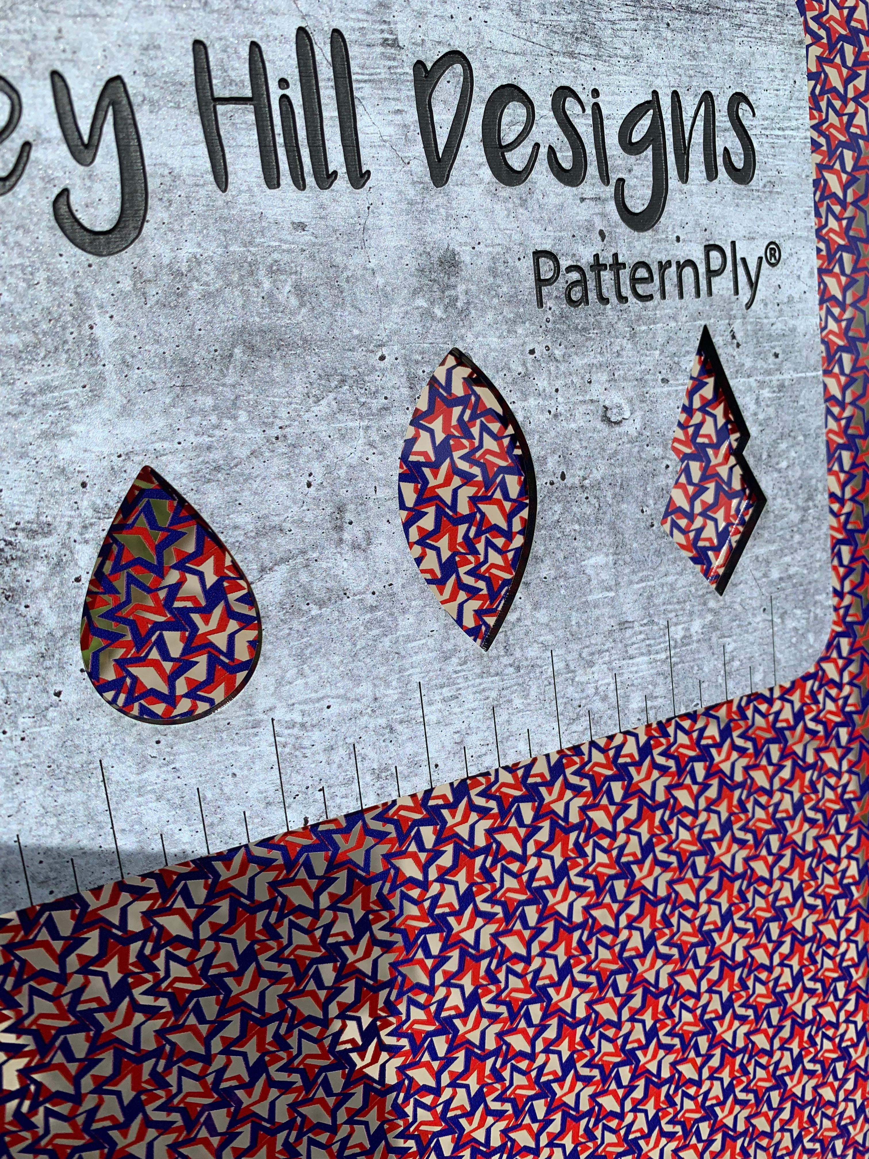 PatternPly® Scattered Red and Blue Overlapping Stars sheet showing the pattern