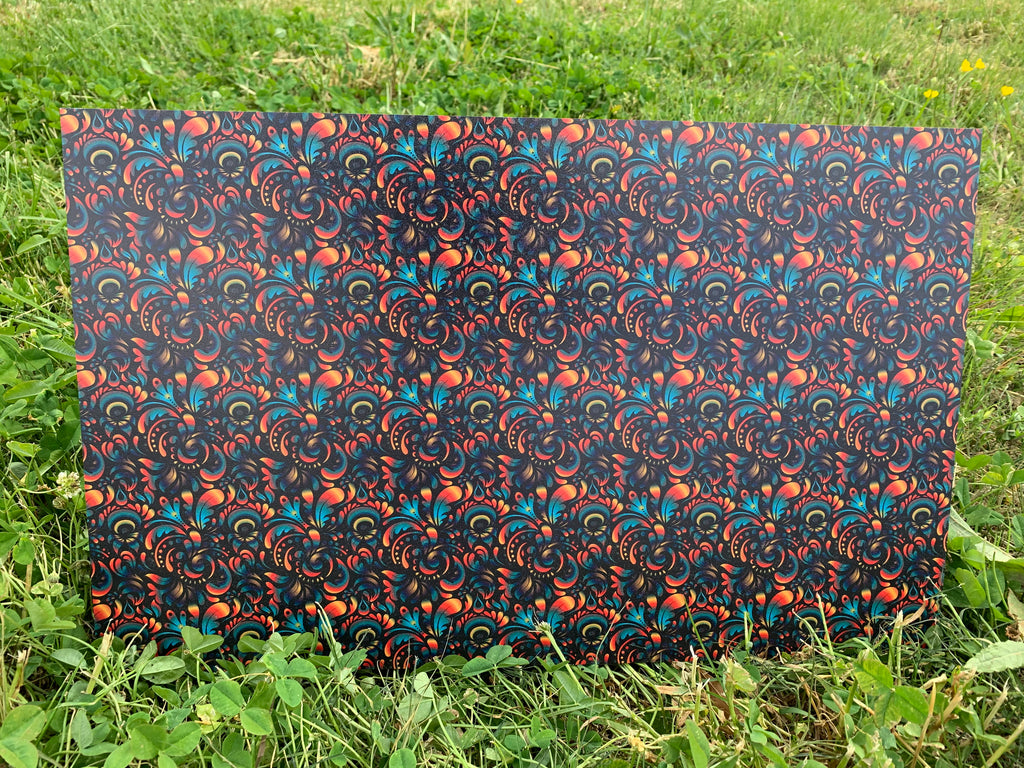 PatternPly® Full Coverage Orange and Blue Scrolls sheet showing the pattern