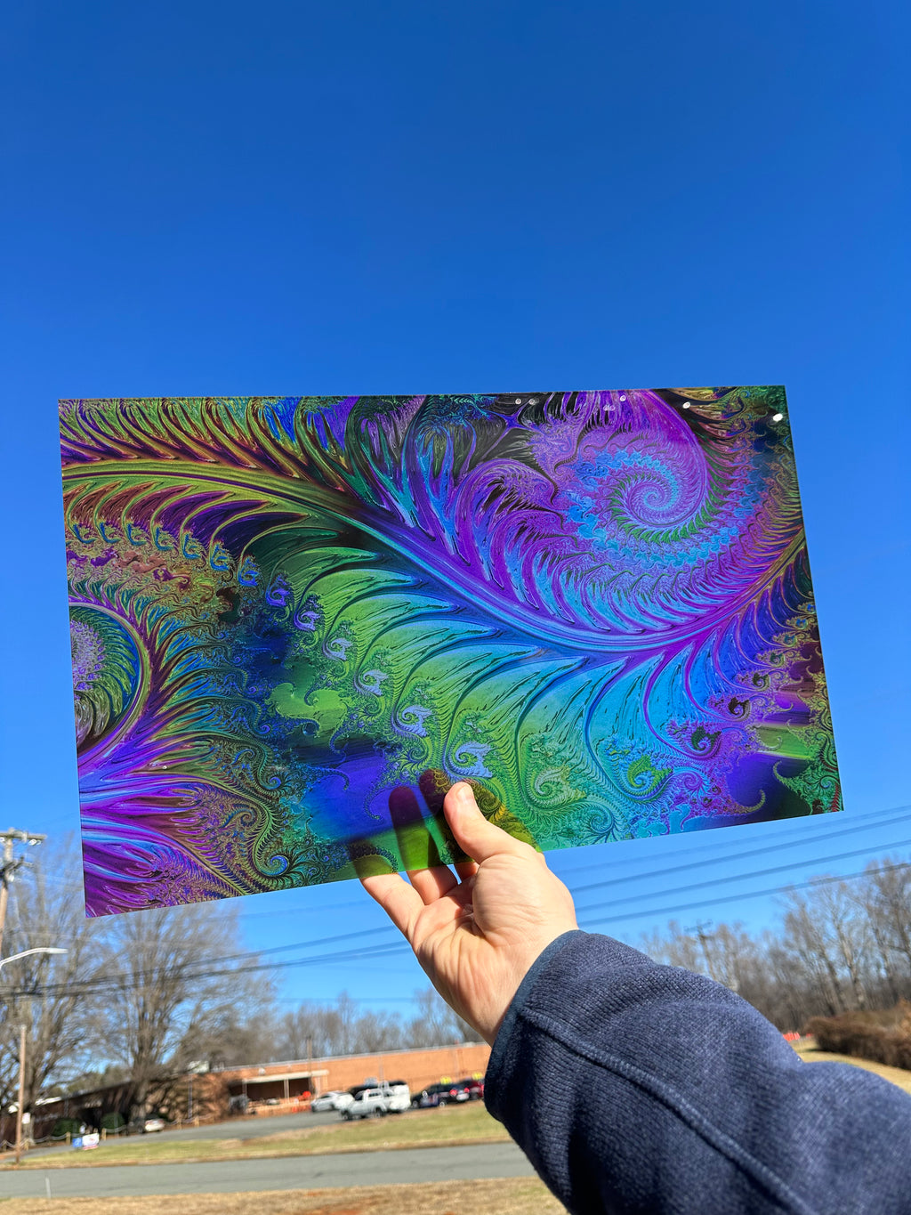 PatternPly® Transparent Glassy Rainbow Swirl sheet showing the pattern