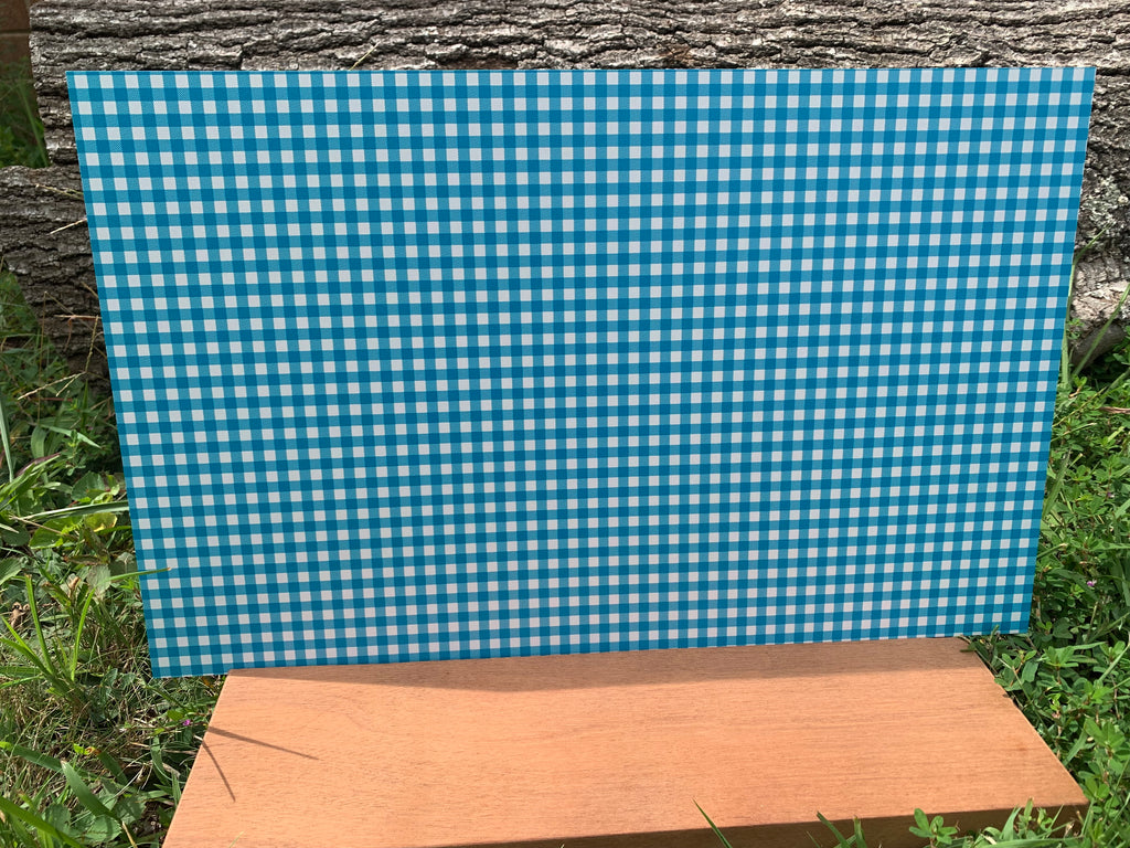 PatternPly® Full Coverage Turquoise and White Buffalo Plaid sheet showing the pattern