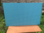 PatternPly® Full Coverage Turquoise and White Buffalo Plaid sheet showing the pattern