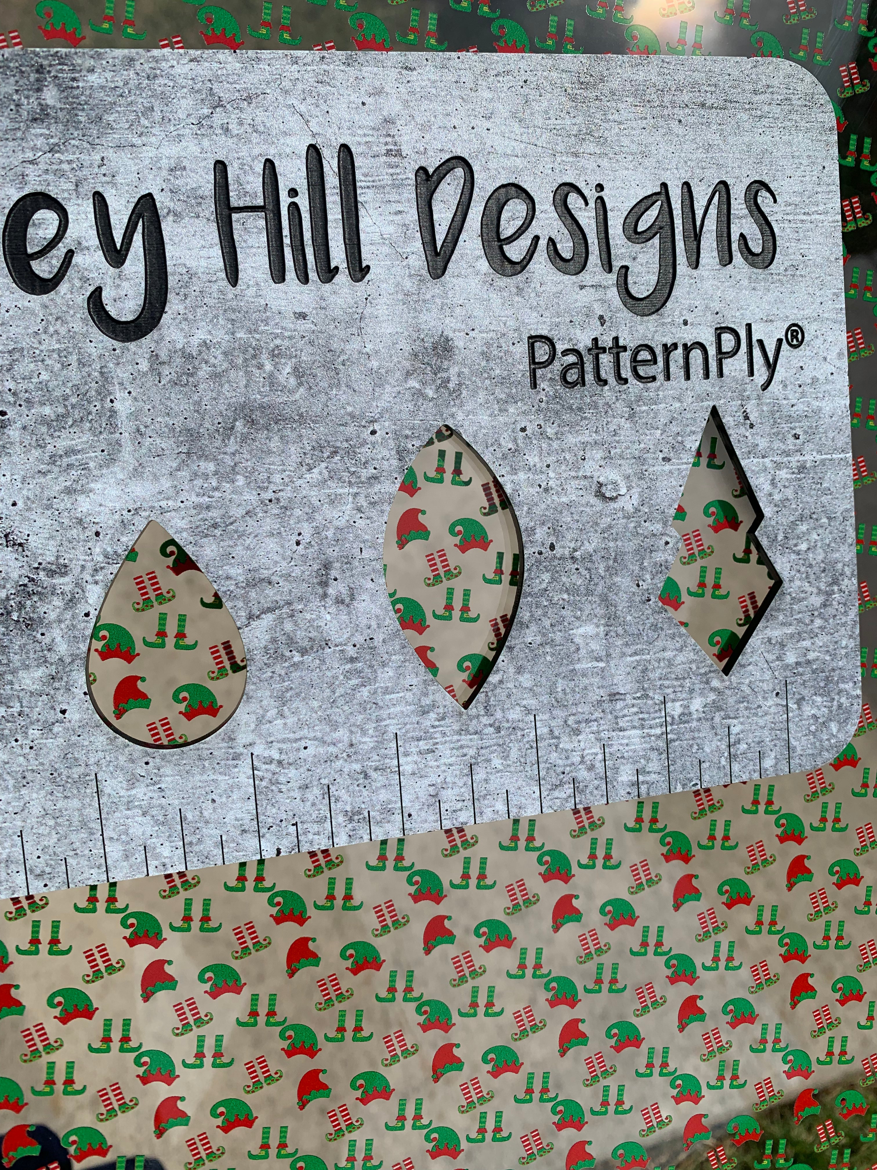 PatternPly® Scattered Elf Hats and Shoes sheet showing the pattern