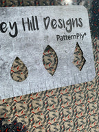 PatternPly® Scattered Christmas Fern sheet showing the pattern