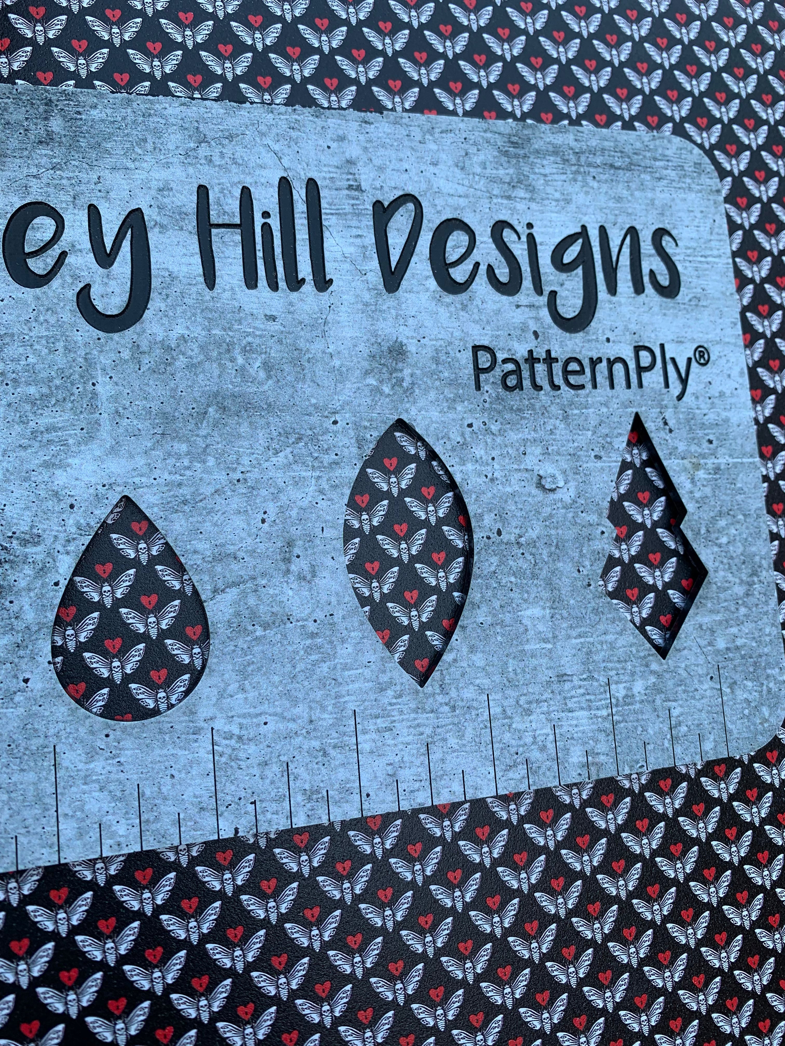 PatternPly® Full Coverage Death's-Head Moths sheet showing the pattern