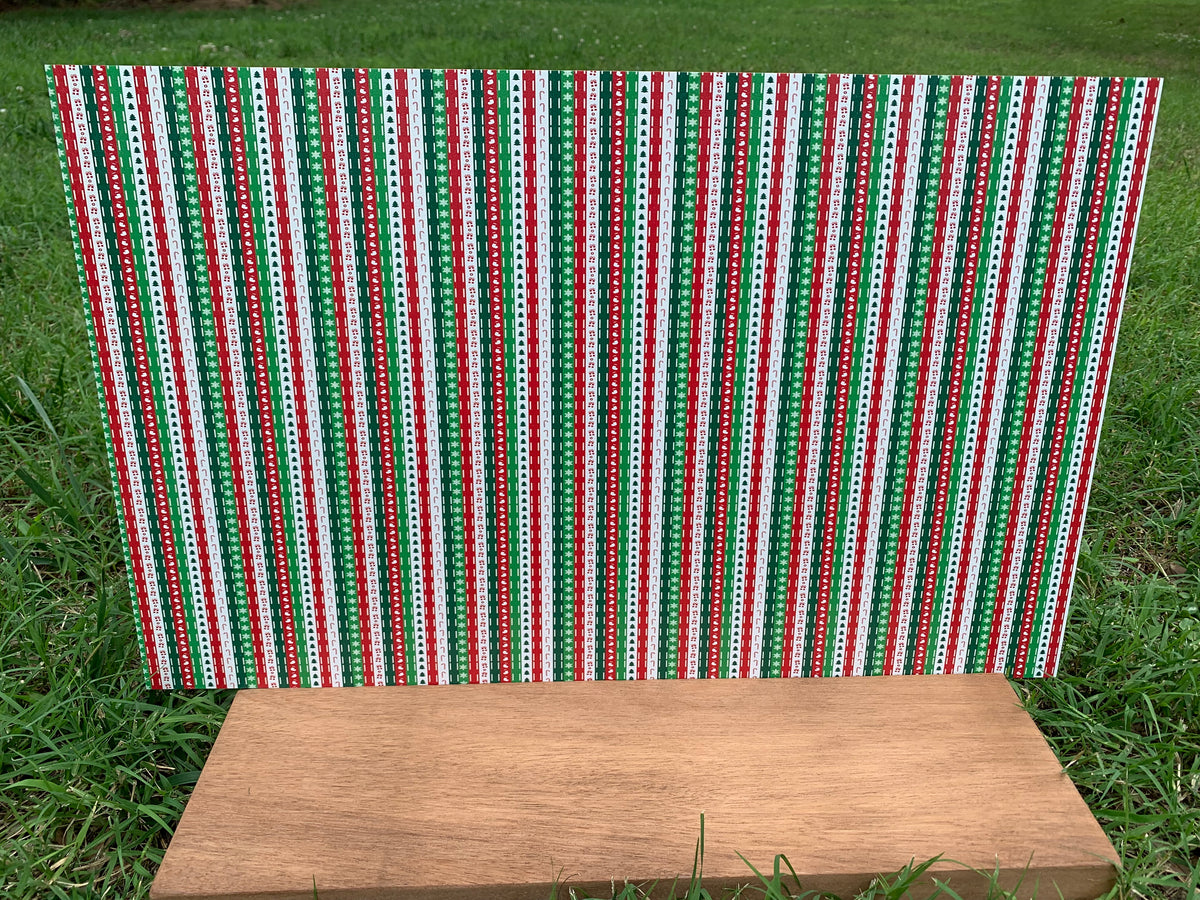 PatternPly® Full Coverage Christmas Icon Stripes sheet showing the pattern