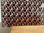 PatternPly® Scattered Deep Red Roses sheet showing the pattern