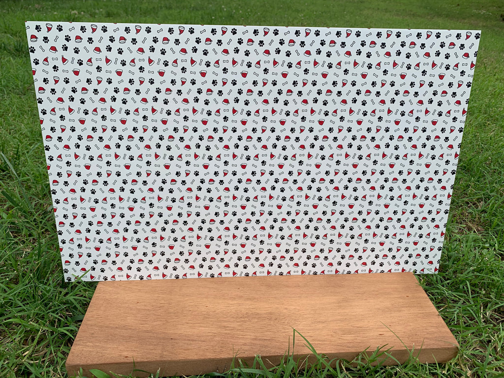 PatternPly® Full Coverage Christmas Pawprints sheet showing the pattern