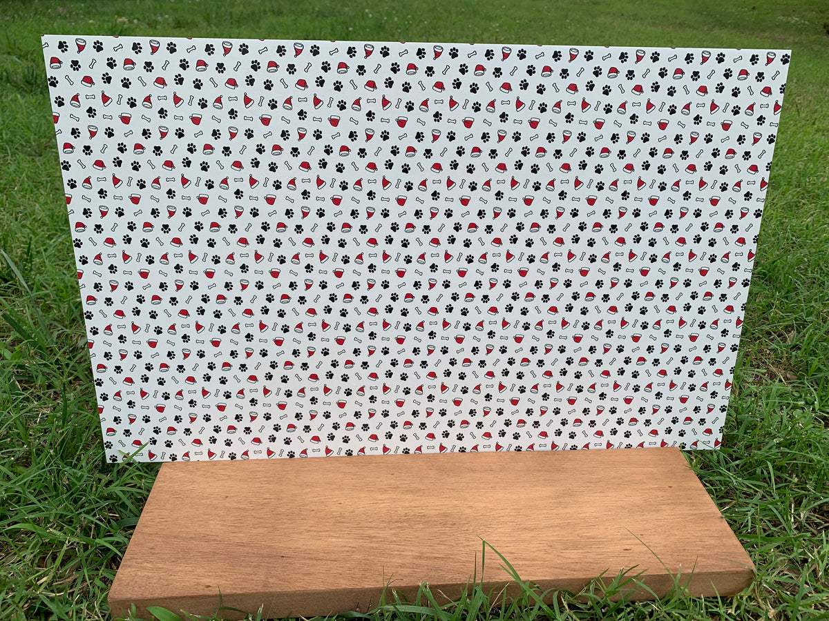 PatternPly® Full Coverage Christmas Pawprints sheet showing the pattern