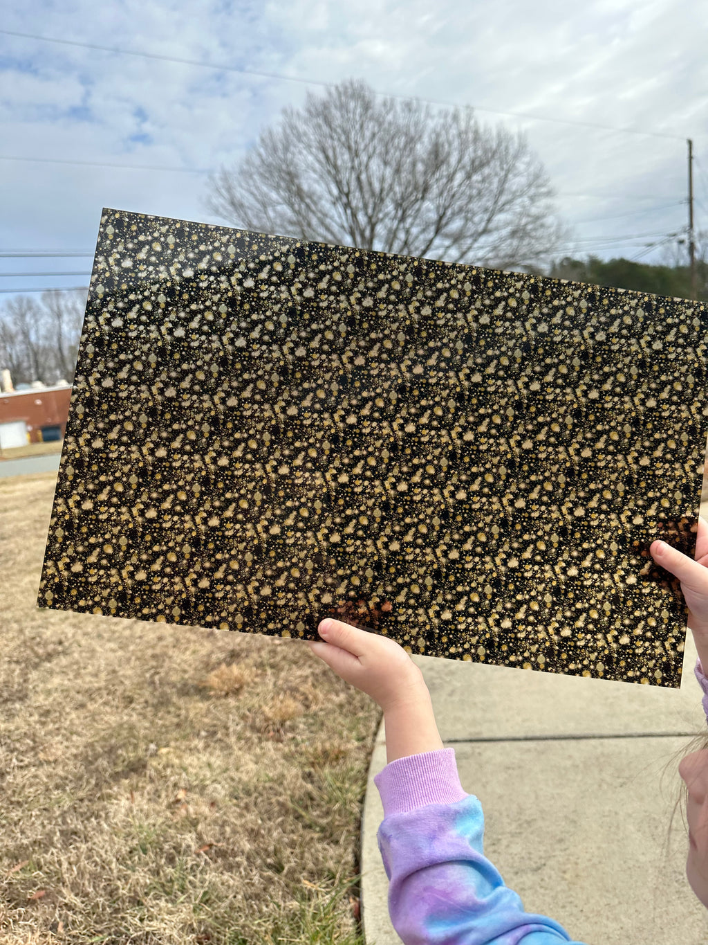 PatternPly® Transparent Black and Gold Splotches sheet showing the pattern