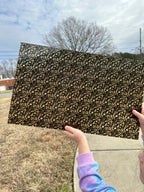 PatternPly® Transparent Black and Gold Splotches sheet showing the pattern