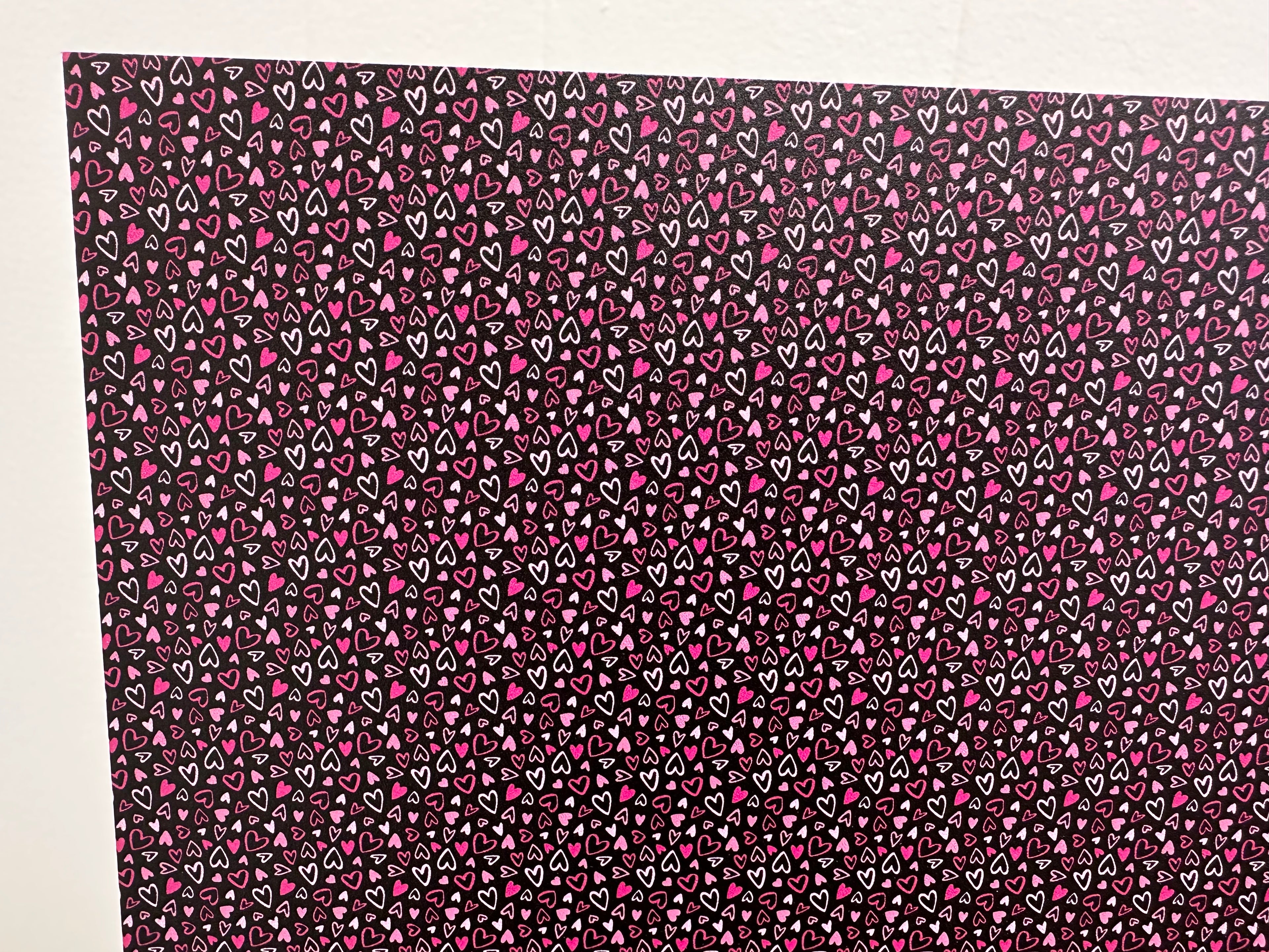 PatternPly® Full Coverage Micro Pink Hearts with Black Background sheet showing the pattern
