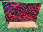 PatternPly® Full Coverage Red and Black Swirls sheet showing the pattern
