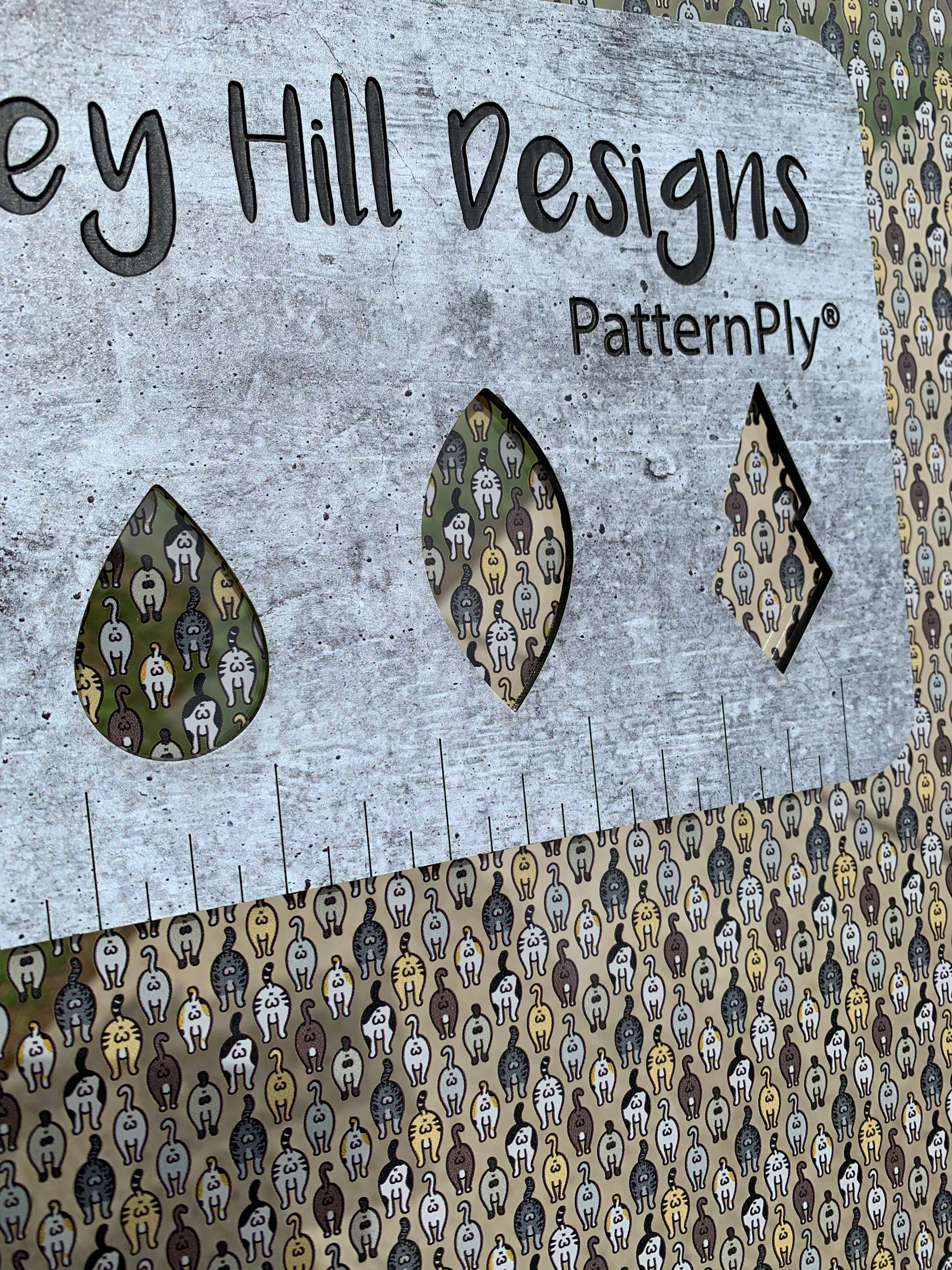 PatternPly® Scattered Cat Butts sheet showing the pattern