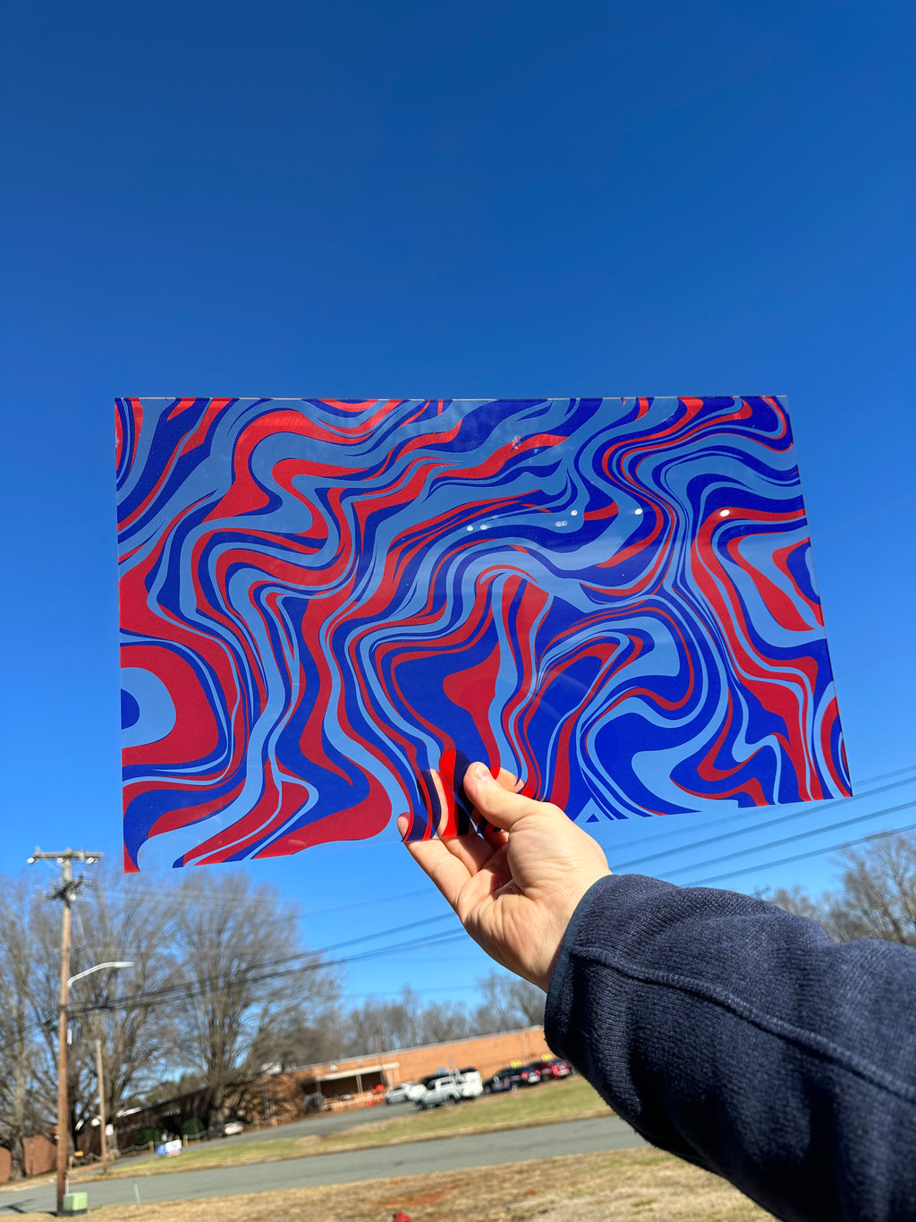 PatternPly® Transparent Large Red and Blue Marbling sheet showing the pattern