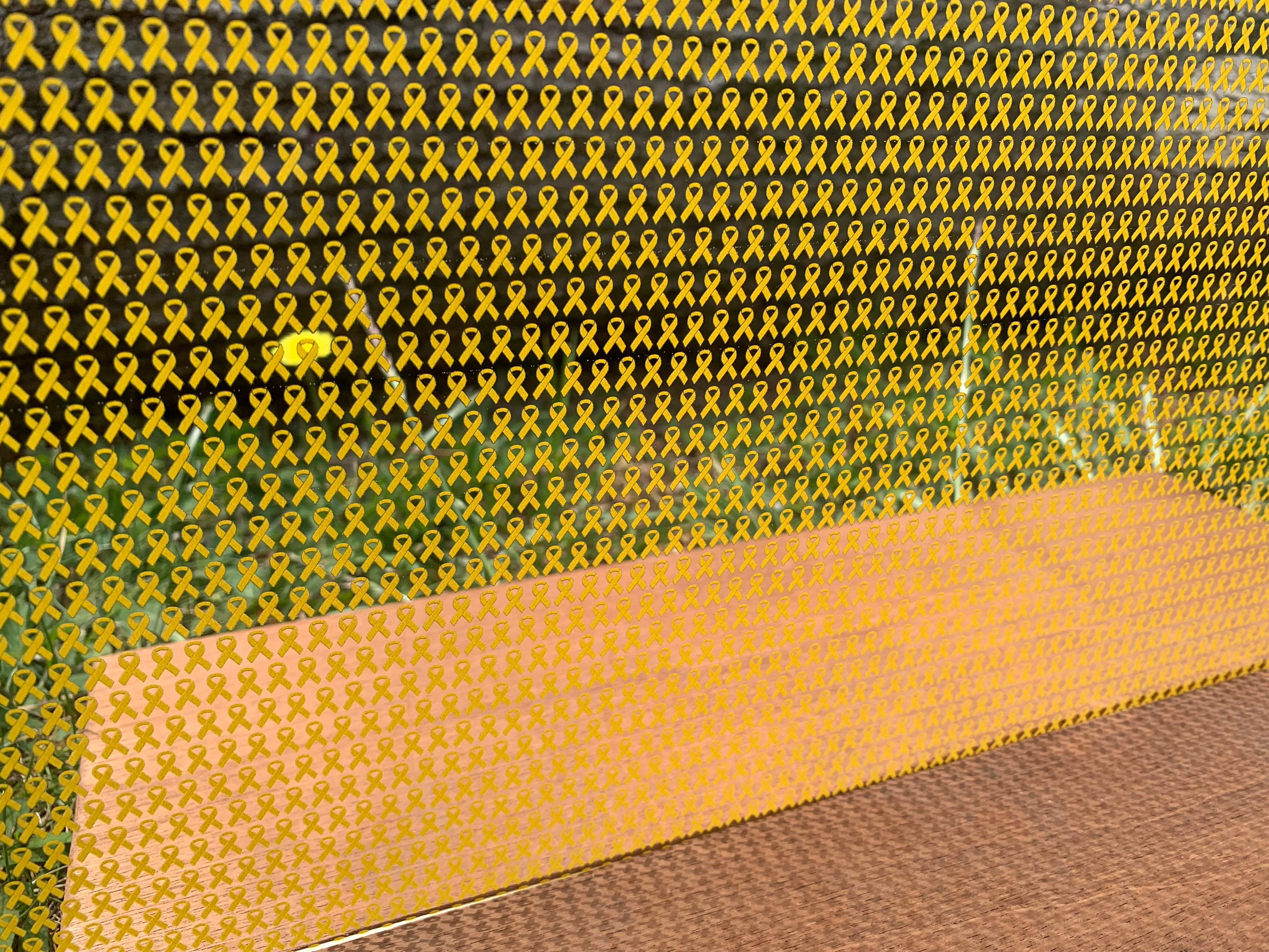 PatternPly® Scattered Mini Yellow Ribbons sheet showing the pattern