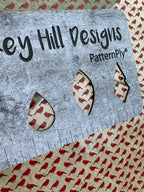 PatternPly® Scattered Cardinals sheet showing the pattern