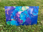 PatternPly® Full Coverage Blue and Purple Paint Swirls sheet showing the pattern