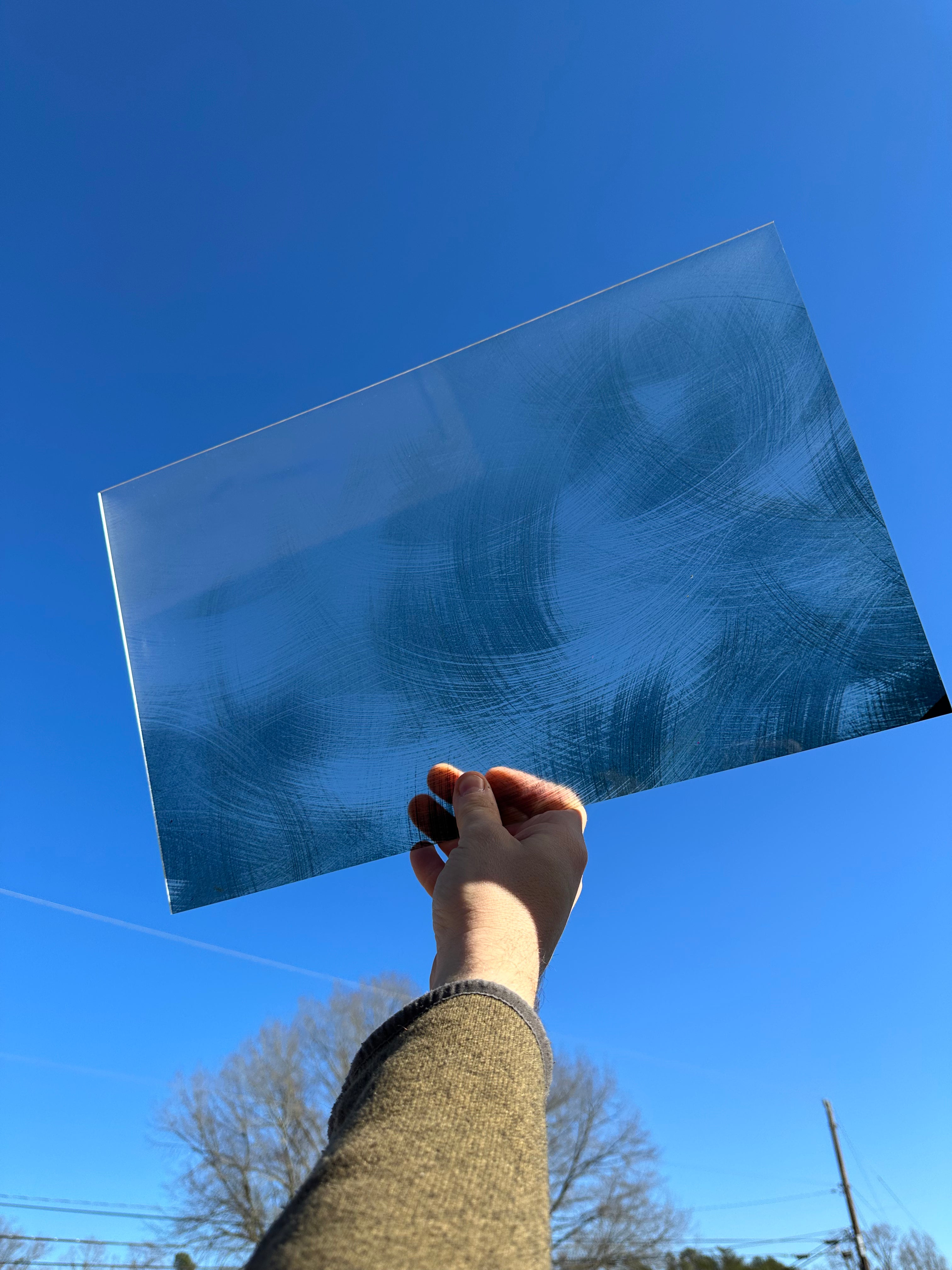 PatternPly® Transparent Swirled Brushed Metal sheet showing the pattern