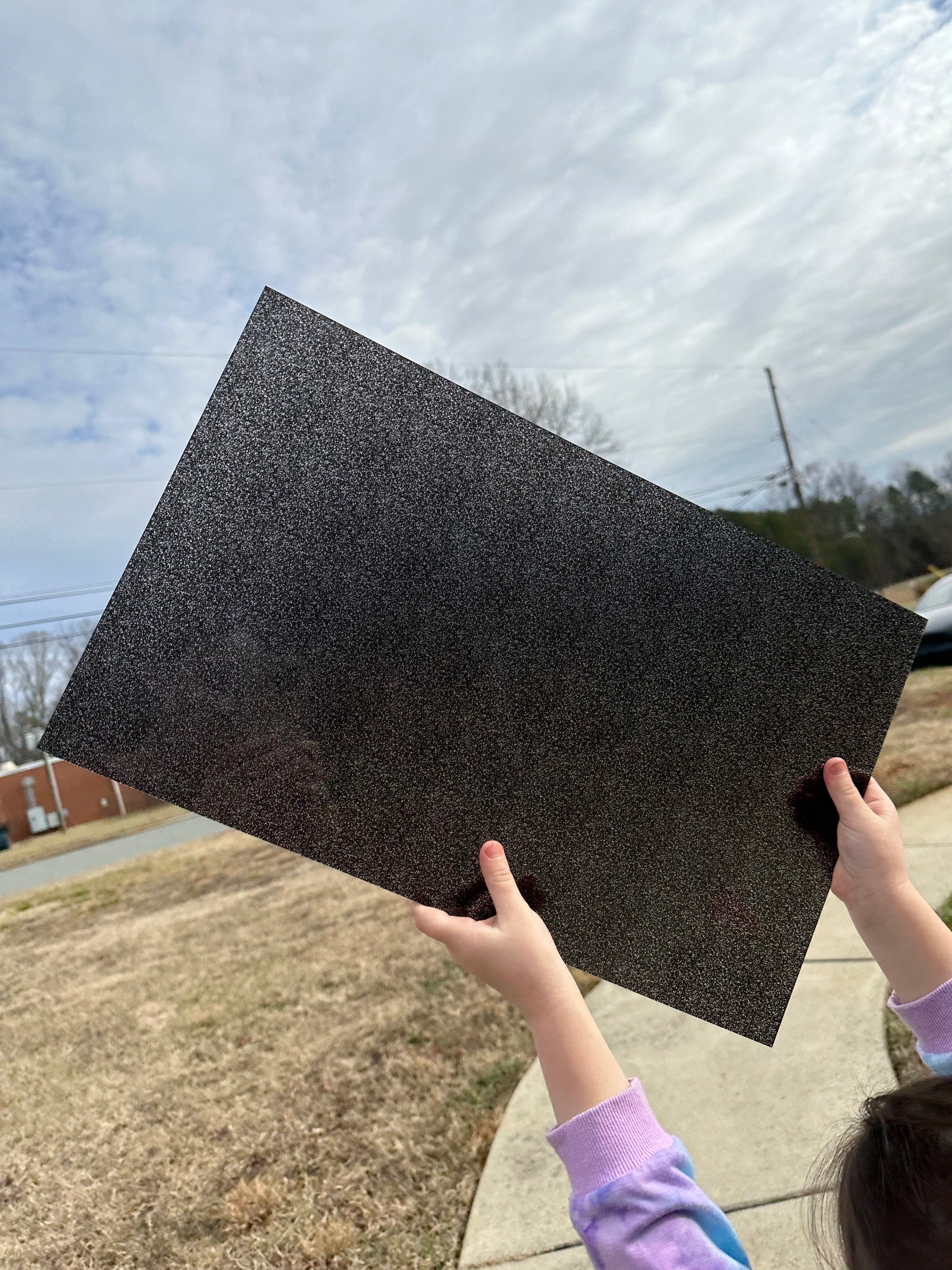 PatternPly® Transparent Black Glitter* sheet showing the pattern