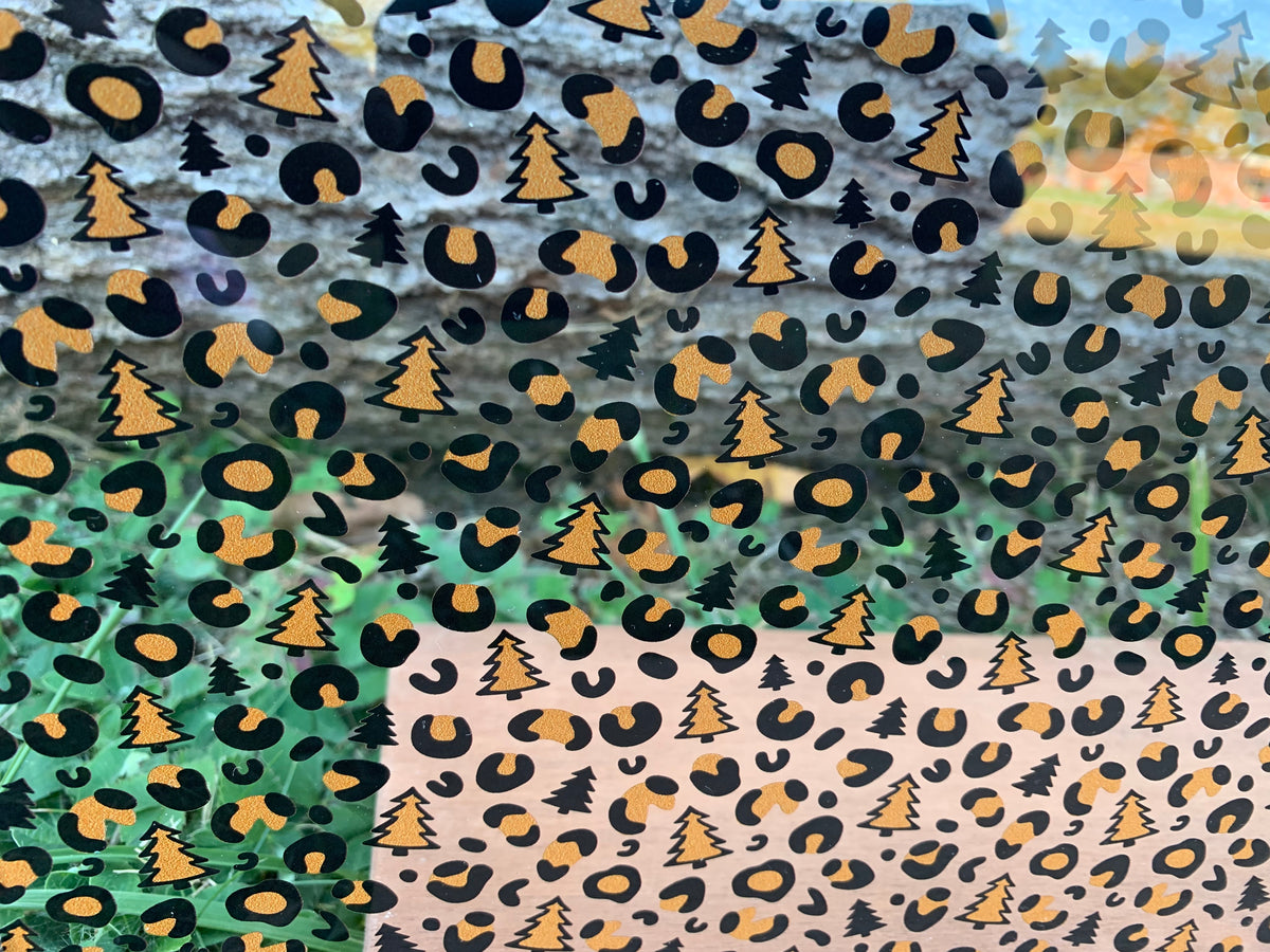 PatternPly® Scattered Christmas Tree Leopard sheet showing the pattern