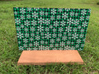 PatternPly® Full Coverage Green Snowflake Buffalo Plaid sheet showing the pattern