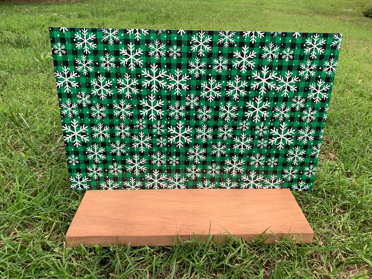 PatternPly® Full Coverage Green Snowflake Buffalo Plaid sheet showing the pattern