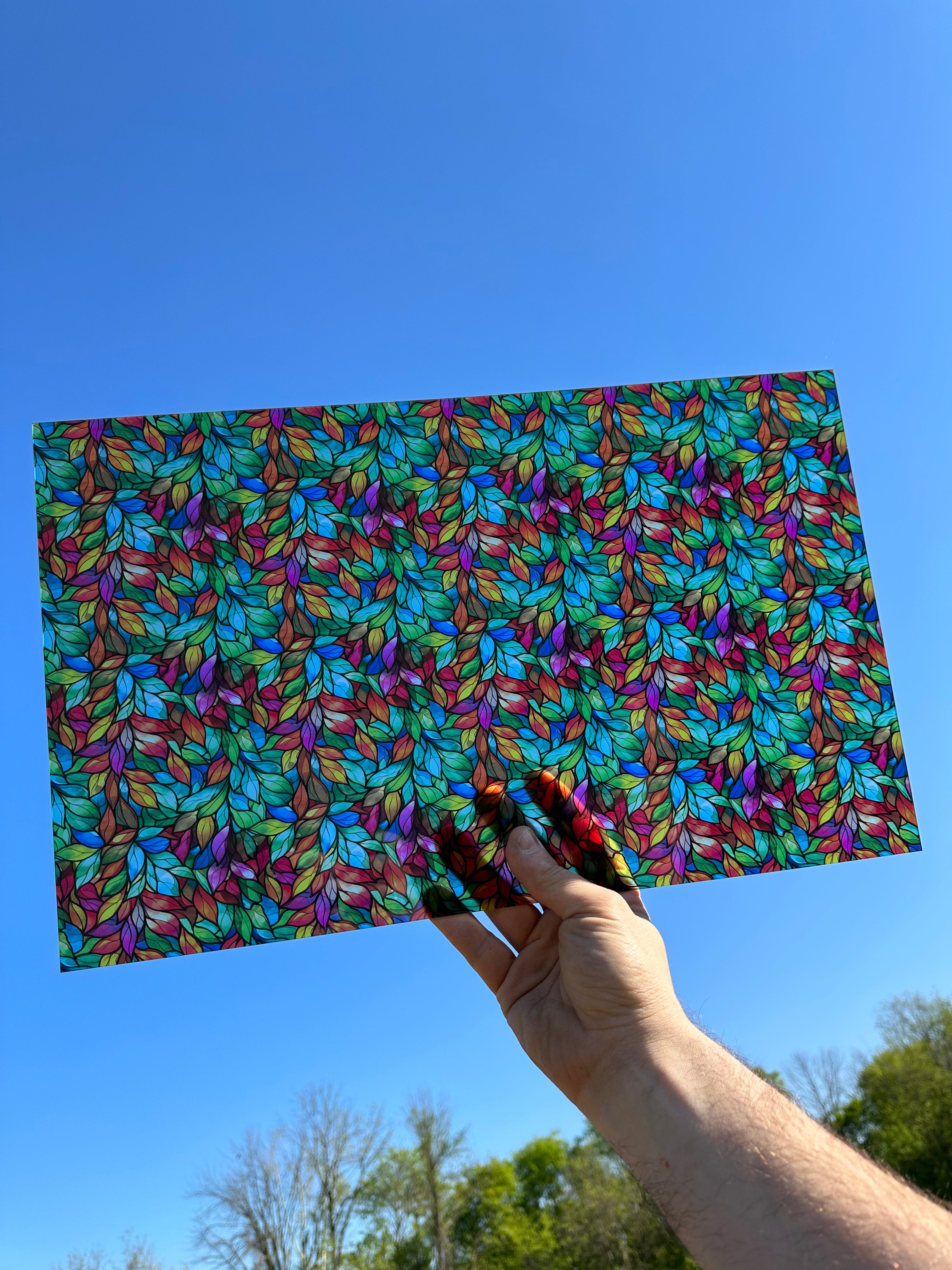 PatternPly® Transparent Rainbow Stained Glass Leaves sheet showing the pattern