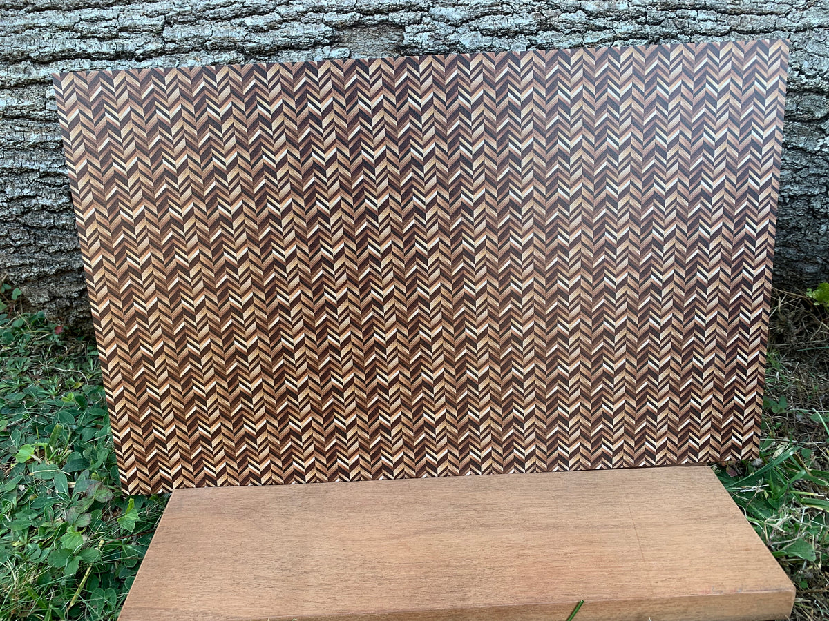 PatternPly® Full Coverage Micro Natural Herringbone sheet showing the pattern