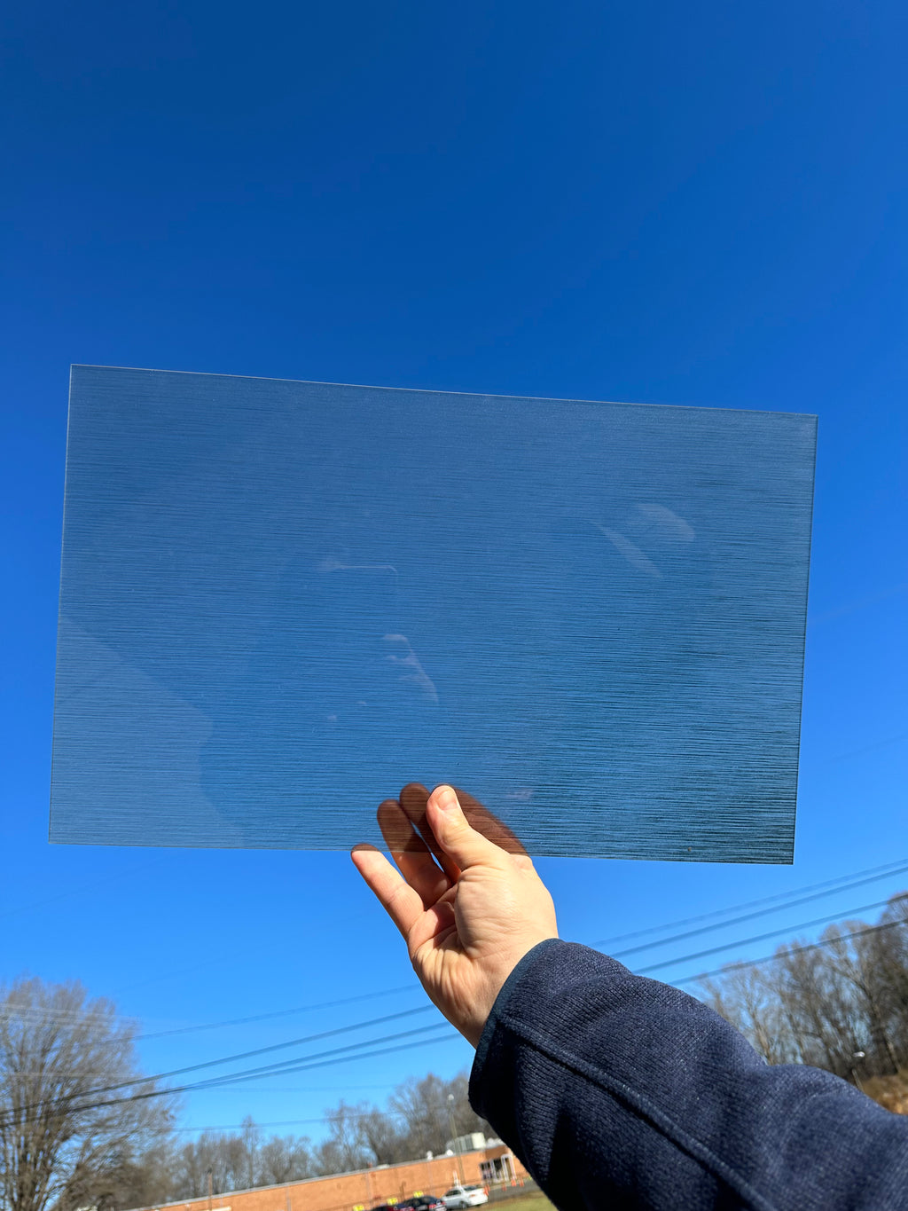 PatternPly® Transparent Linear Brushed Metal sheet showing the pattern