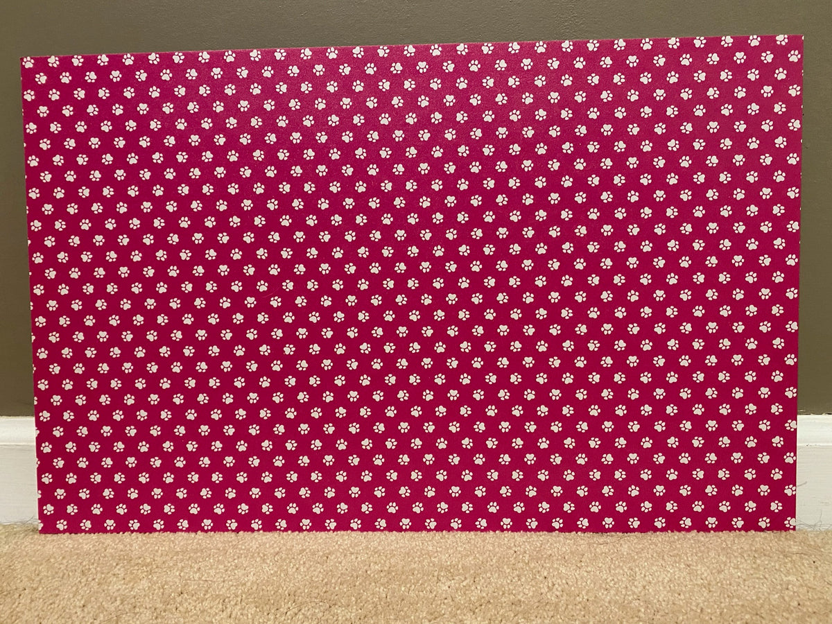 PatternPly® Full Coverage Pink and White Paw Prints sheet showing the pattern