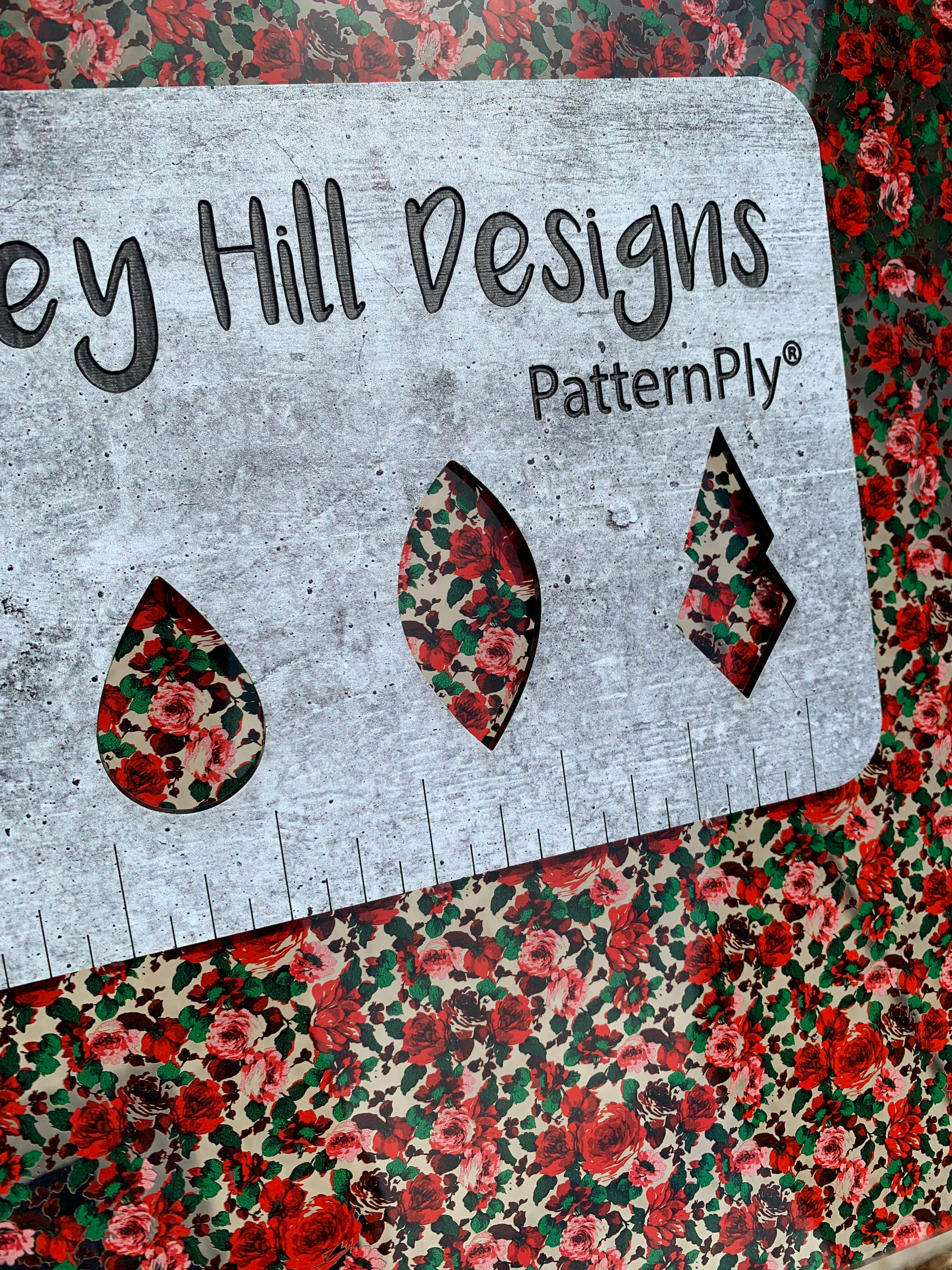 PatternPly® Scattered Christmas Roses sheet showing the pattern