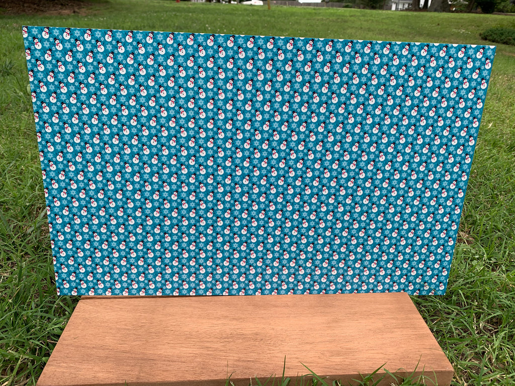 PatternPly® Full Coverage Blue Snowman sheet showing the pattern