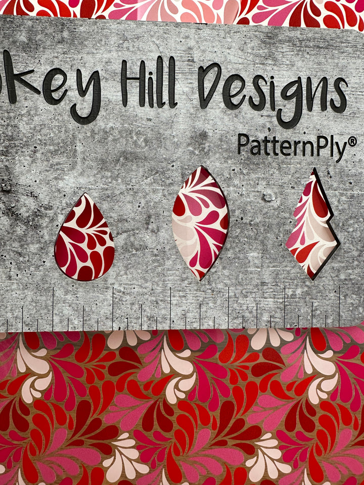 PatternPly® Scattered Red, White, and Pink Petals