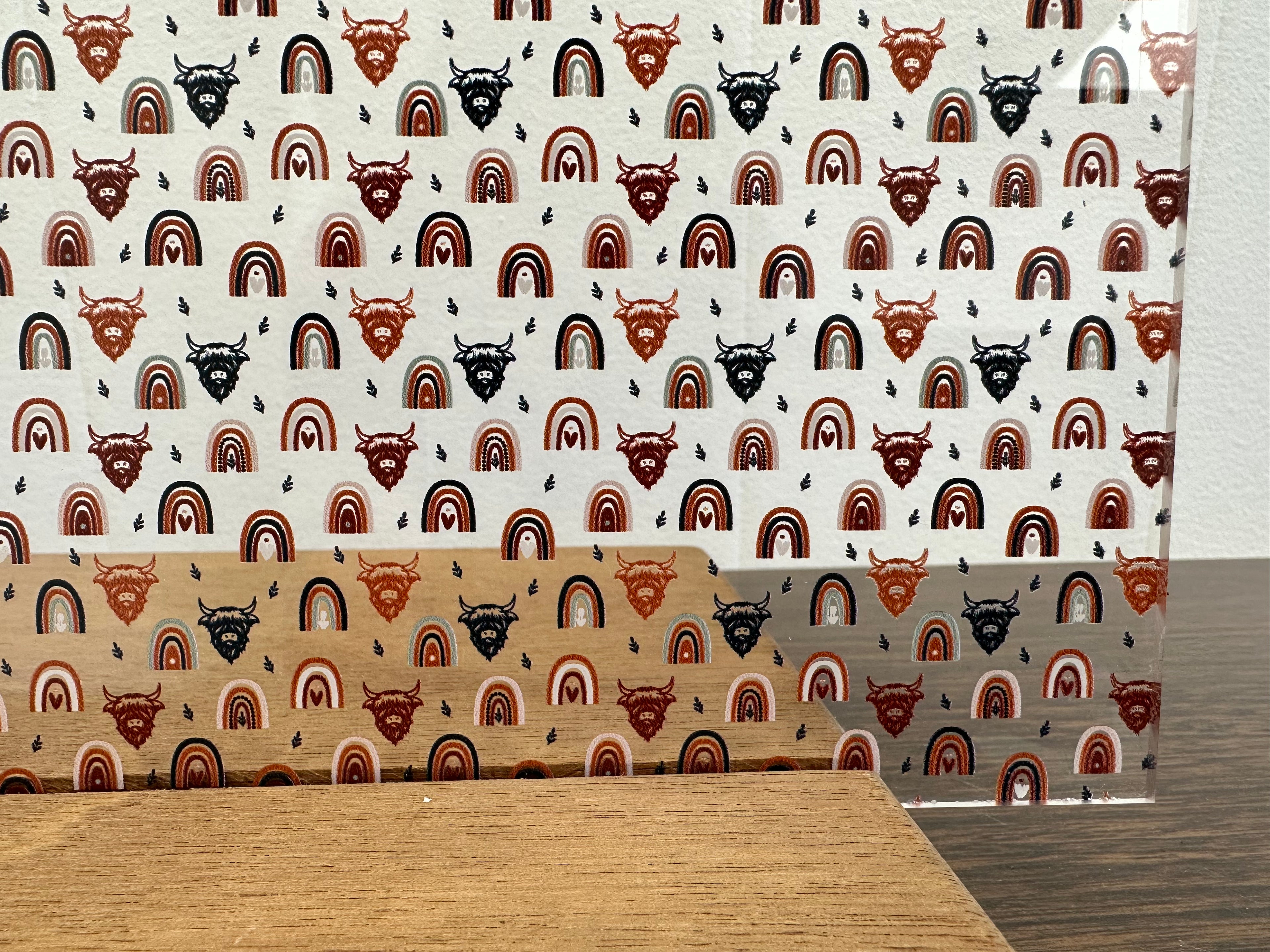 PatternPly® Scattered Highland Cows and Boho Rainbows sheet showing the pattern
