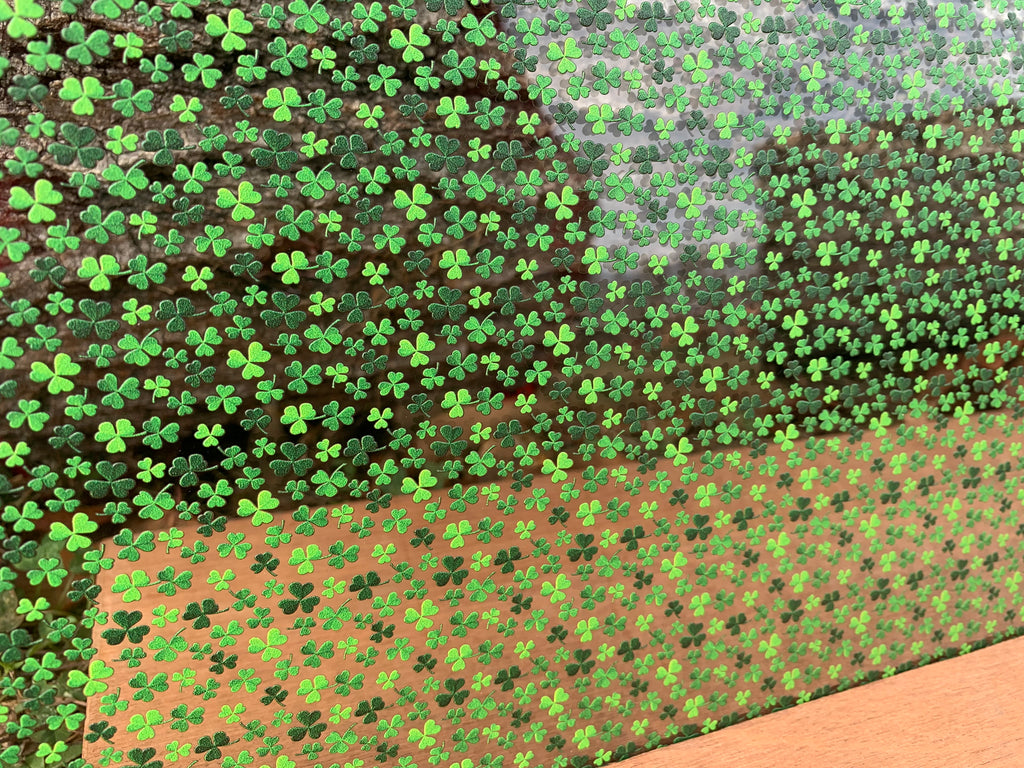 PatternPly® Scattered Mini Clovers sheet showing the pattern