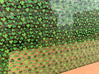 PatternPly® Scattered Mini Clovers sheet showing the pattern