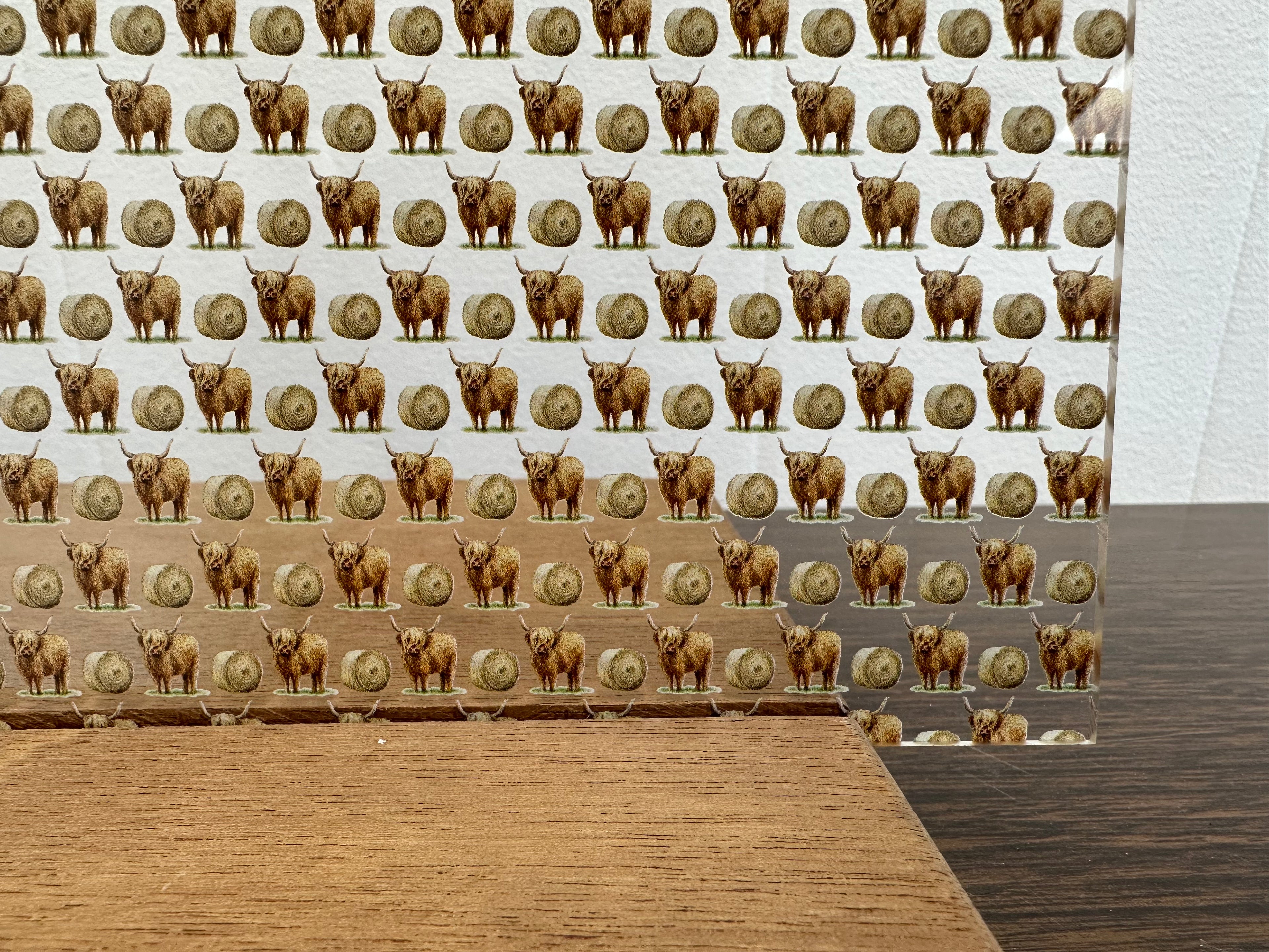 PatternPly® Scattered Highland Cows and Round Bales sheet showing the pattern