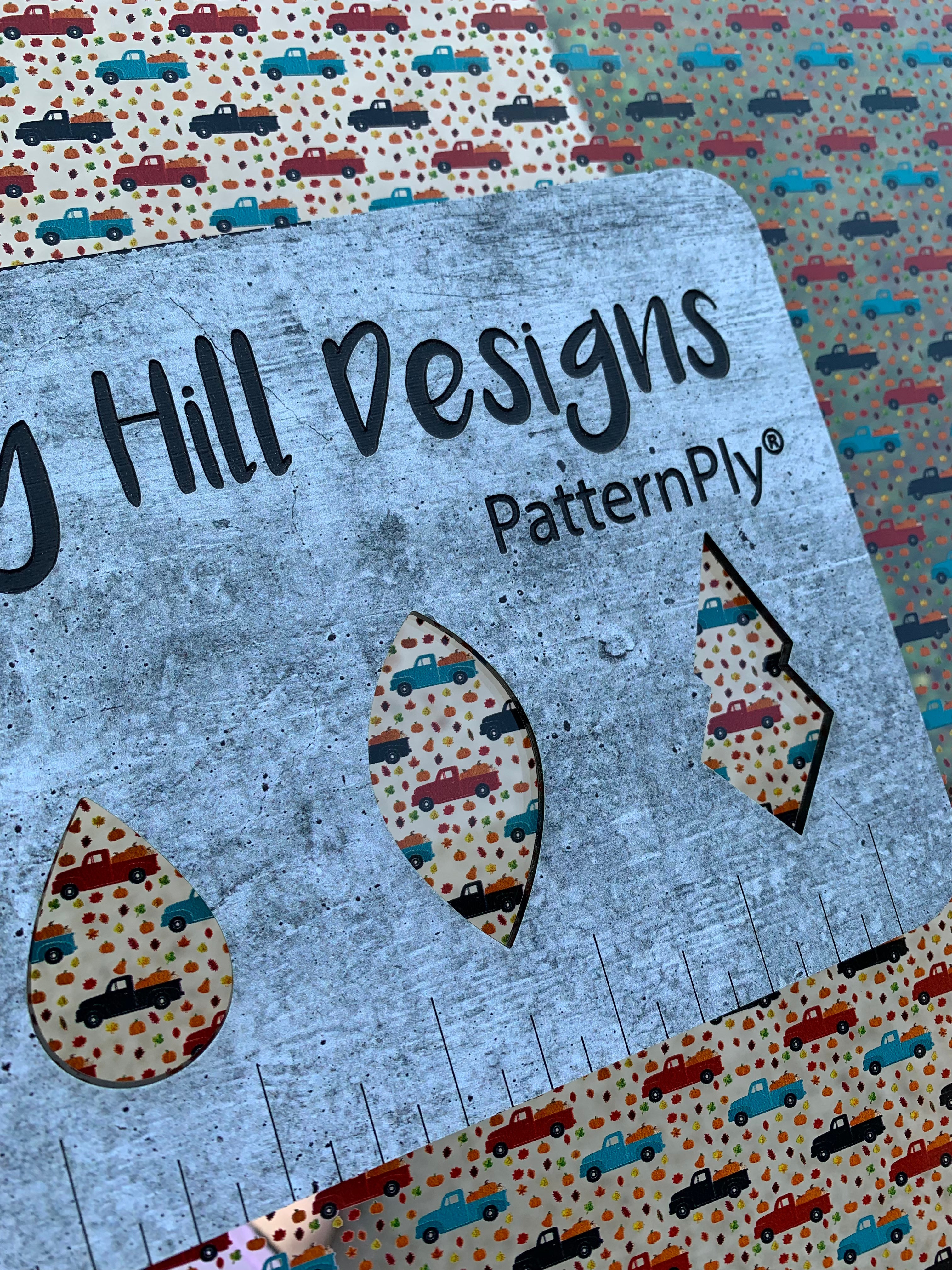 PatternPly® Scattered Pumpkin Trucks sheet showing the pattern